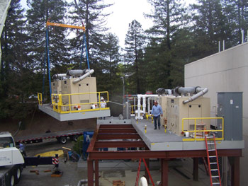 Workers at construction site installing a generator